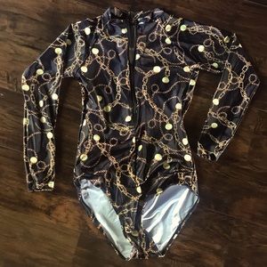 Long sleeve swim suit.